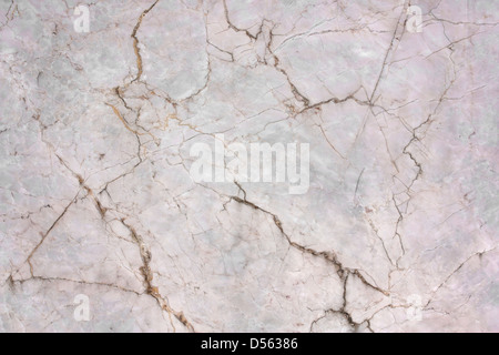 Cracks in the marble pattern tile wall. Stock Photo