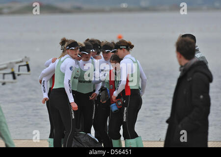 Eton Dorney, UK. 24th March 2013. The Cambridge crew tearfully embracing on the jetty at Dorney Lake, Eton, after losing The Newton Women's University Boat Race. Despite taking an early lead, in the end, Cambridge lost to Oxford by 1.75 lengths in 7m21s. Credit: Michael Preston / Alamy Live News