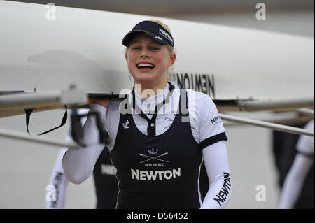 Eton Dorney, UK. 24th March 2013. Amy Varney (seat 5) looking happy and flushed with success after rowing in The Newton Women's University Boat Race. Although Cambridge took an early lead, the Oxford team fought back to win by 1.75 lengths in 7m21s. Credit: Michael Preston / Alamy Live News Stock Photo