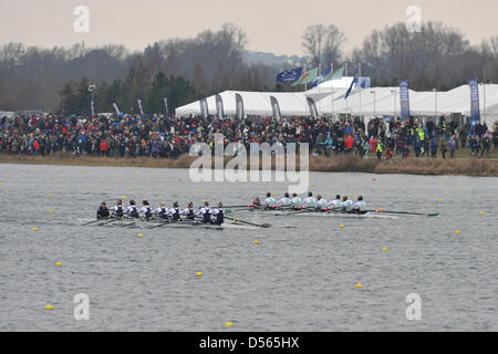 Eton Dorney, UK. 24th March 2013. The Cambridge and Oxford crews contest The Newton Women's University Boat Race at Eton Dorney. As they pass the 1250m mark Oxford draw level with Cambridge. Credit: Michael Preston / Alamy Live News Stock Photo