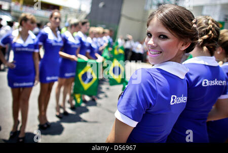 Grid girld line up for the drivers' parade at Autodromo Jose Carlos Pace circuit in Interlagos, Sao Paulo, SP, Brazil, 07 November 2010. The 2010 Formula 1 Grand Prix of Brazil, the last-but-one race of the 2010 Formula One season, is held on 07 November 2010. Photo: Jan Woitas Stock Photo