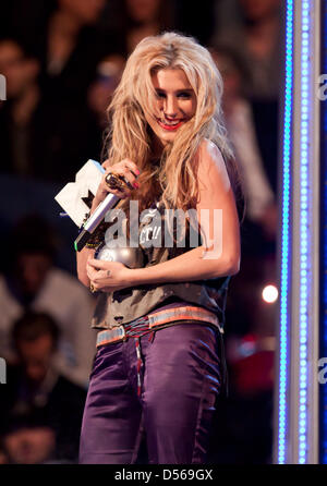 US singer Kesha smiles after receiving the Best New Act award during the 2010 MTV Europe Music Awards (EMA) held at the Caja Magica in Madrid, Spain, 07 November 2010. Photo: Hubert Boesl Stock Photo