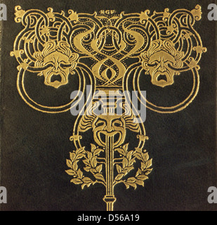 A section of the front cover of an antiquarian gold tooled leather bound volume of Shakespeares plays Stock Photo
