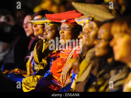 Women wearing the traditional dress of Herero people attend a fashion show in Berlin, Germany, 10 November 2010.  The Namibian Embassy to Germany invited to a gala evening on the occasion of the 10th anniversary of the twinning between Berlin and Windhoek. Photo: Britta Pedersen Stock Photo