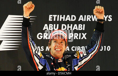 The 2010 Formula One World Champion, Germany's Sebastian Vettel of Red Bull Racing at Yas Marina Circuit in Abu Dhabi, United Arab Emirates, 14 November 2010. Winning the Formula 1 Abu Dhabi Grand Prix, Vettel clinched the title and becomes the youngest-ever world champion. Photo: Jens Buettner Stock Photo