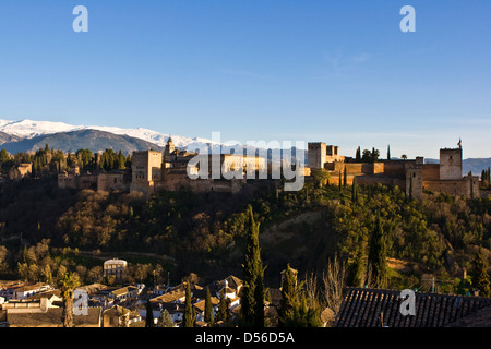 Panorama panoramic vista view of Alhambra Palace UNESCO world heritage site and Sierra Nevada Mountains Granada Andalusia Spain Stock Photo
