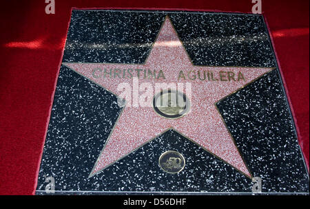 The new star of US singer and actress Christina Aguilera on the Hollywood Walk of Fame in Los Angeles, CA, United States, 15 November 2010. Photo: Hubert Boesl Stock Photo