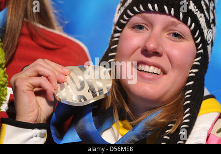 German Andrea Rothfuss celebrates her silber medal in the standing ...