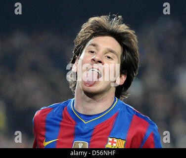 Barcelona's Lionel Messi sticks out his tongue after missing a chance to score during the Champions League round of the last 16 second leg match between Spanish side FC Barcelona and German Bundesliga club VfB Stuttgart at Nou Camp stadium in Barcelona, Spain, 17 March 2010. Barcelona defeated Stuttgart 4-0. Photo: Bernd Weissbrod Stock Photo