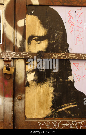 reproduction of La Gioconda on a locked door Stock Photo