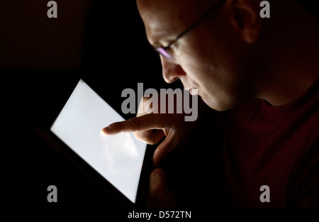 man using a tablet PC Stock Photo