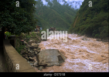 The raging torrents of the Urubamba river in full flood near Aquas Calientes, Peru. This is the access point to Machu Picchu site Stock Photo