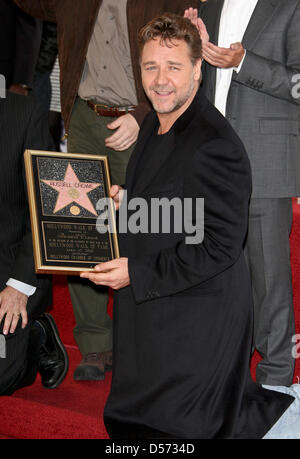 Australian actor Russell Crowe receives the 2,404th star on the Hollywood Walk of Fame in Hollywood, California, USA, 12 April 2010. Crowe, a three-time consecutive Academy Award Best Actor nominee, took home the Oscar for his performance in ''Gladiator''. Photo: Hubert Boesl Stock Photo