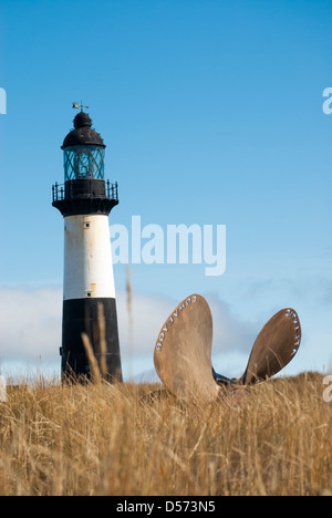Cape Pembroke Lighthouse with Atlantic Conveyor memorial, Stanley, Falkland Islands Stock Photo
