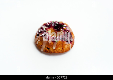 Gugelhupf cake decorated with icing sugar and sprinkles Stock Photo