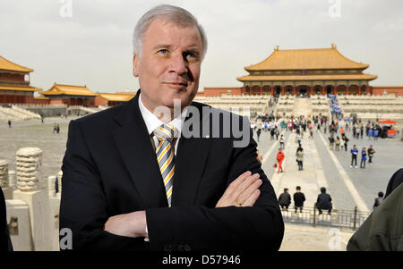 Bavaria's minister president Horst Seehofer stands in front of the Hall of Supreme Harmony in the Forbidden City in Beijing, China, 27 April 2010. Together with Bavarian economy delegates, Seehofer visits Beijing and the Bavarian partner region Shandong until 30 April 2010. Photo: PETER KNEFFEL