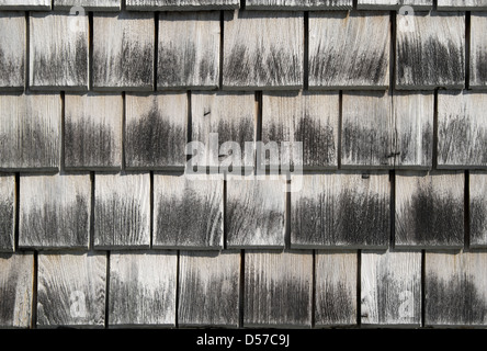 Wooden tiles pattern. Detail of an old house wall. Stock Photo
