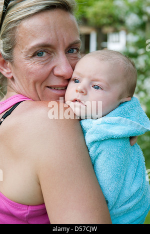 Baby and grandmother, portrait Stock Photo