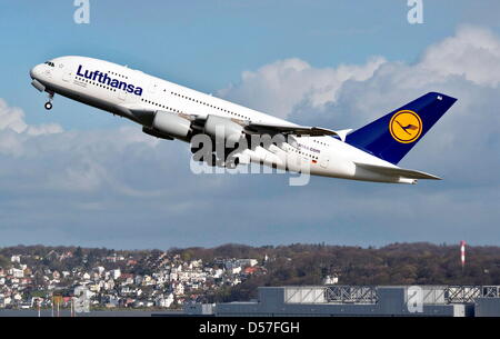 (FILE) A file picture dated 21 April 2010 of the first completely coated and fully equipped Airbus A380 of Lufthansa taking off at the airport in Hamburg, Germany. On 19 May, Lufthansa will put their first A380 in service. The plane is 72 metres long, can carry 526 passengers and bears the name 'Frankfurt am Main'. Selected guests will fly from Hamburg to Frankfurt/Main, where the  Stock Photo