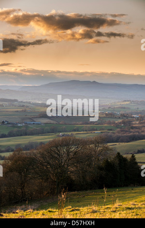 VIEW OVER THE VALE OF USK TOWARDS ABERGAVENNY AND THE SUGAR LOAF WITH MISTY SUNSET Stock Photo