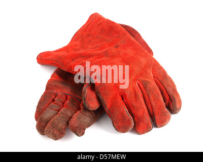 Two red gloves on white background.. The gloves are protective wear. Stock Photo
