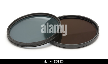 Neutral density and polarizing filters on a white background. Stock Photo