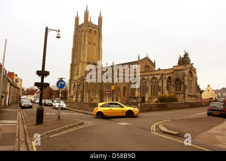 Modified yellow Renault car close to St Cuthbert's  Church in Wells Somerset. The church used in the film Hot Fuzz 26th Mar 2013 Stock Photo