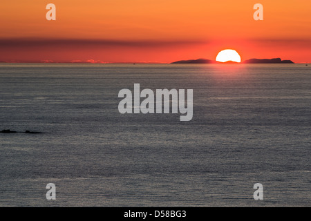 Setting sun over Summer isles at Achiltibuie in Scotland. Stock Photo