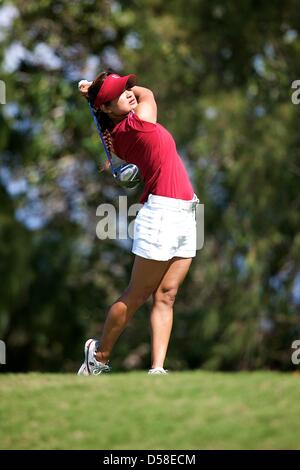 Kapalua, Hawaii, USA. 25th March 2013. Mariko Tumangan of Stanford hits a drive during the 2013 Anuenue Spring Break Classic hosted by University of Hawaii at the Kapalua Bay Course on the island of Maui. Credit: Cal Sport Media / Alamy Live News Stock Photo