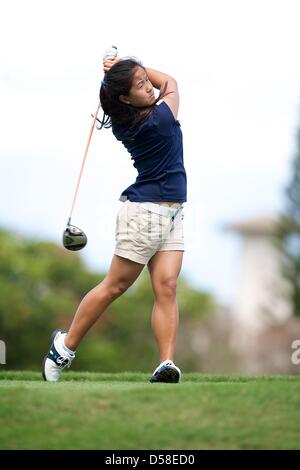 Kapalua, Hawaii, USA. 25th March 2013. Grace Na of Pepperdine tees off during the 2013 Anuenue Spring Break Classic hosted by University of Hawaii at the Kapalua Bay Course on the island of Maui. Credit: Cal Sport Media / Alamy Live News Stock Photo