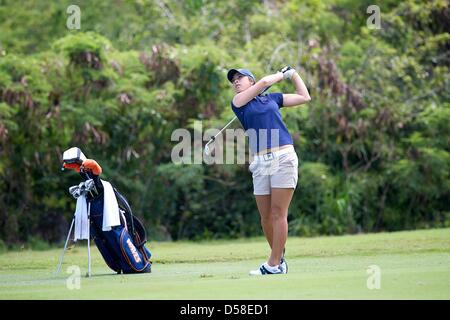 Kapalua, Hawaii, USA. 25th March 2013. Alana Ching of Pepperdine takes a swing during the 2013 Anuenue Spring Break Classic hosted by University of Hawaii at the Kapalua Bay Course on the island of Maui. Credit: Cal Sport Media / Alamy Live News Stock Photo