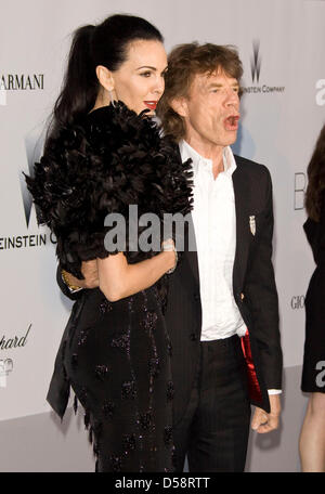 Rolling Stones singer Mick Jagger and his partner L'Wren Scott attend the amfAR Cinema Against Aids Gala within the scope of the 63rd Cannes Film Festival 2010 at the Hotel Du Cap in Cap d'Antibes, France, 20 May 2010. Photo: Hubert Boesl Stock Photo