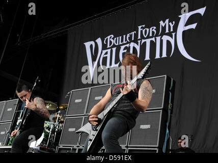 Welsh metal band Bullet For My Valentine with bassist Jason James (L) and guitarist Matthew Tuck (R) performs with lead singer Matthew Bellamy perform at Rock am Ring festival at Nurburgring in Nuerburg, Germany, 06 June 2010. The four-day festival sold out with 85,000 visitors. Photo: HARALD TITTEL Stock Photo