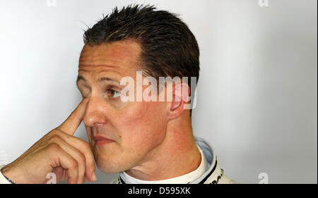 Germany's Formula One driver Michael Schumacher of Mercedes GP stands in his pit and watches the times of the other drivers during the third training on race track ''Gille Villeneuve'' in Montreal, Canada, 12 June 2010. After a one year break on the race track, the Formula One Grand Prix of Canada will be held in Montreal on 13 June 2010. Photo: Jens Buettner Stock Photo