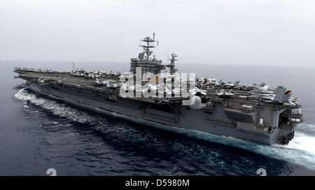 The picture shows the US nuclear-powered aircraft carrier USS Harry S. Truman at an undisclosed position in the Mediterranean Sea south of Sicily, 14 June 2010. German Defence Minister zu Guttenberg visited the US aircraft carrier and the German Navy frigate 'Hessen' which is part of the accompanying convoy. Photo: FABRIZIO BENSCH Stock Photo