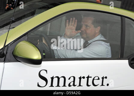 Stefan Mappus, Prime Minister of Baden-Wuerttemberg, sits in a 'smart electric drive' in Stuttgart, Germany, 18 June 2010. Car manufacturer Daimler, power supplier EnBW and Baden-Wuerttemberg want to build about 700 loading stations until the end of 2011 and test 200 vehicles with electric and fuel cell-powered engines in the model project 'e-mobility Baden Wuerttemberg'. Photo: Ma Stock Photo