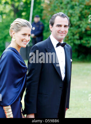 Prince Nikolaos of Greece and Tatiana Blatnik arrive for the goverment dinner held at the Eric Ericson Hall on Skeppsholmen, one of the islands of Stockholm, on the occasion of the wedding of Crown Princess Victoria of Sweden and Daniel Westling in Stockholm, Sweden, 18 June 2010. The royal wedding ceremony of Crown Princess Victoria of Sweden and Daniel Westling will take place on Stock Photo
