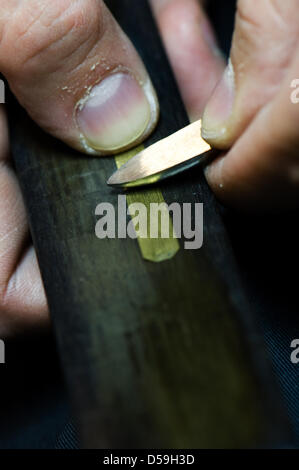 Organ builder Markus Schanze works on a Silbermann organ dating 1714 in the cathedral of Freiberg, Germany, 22 June 2010. The organ is one of the world's most prized ones, restauration of 170,000 euro costs have been completed on 24 June. Photo: Arno Burgi Stock Photo