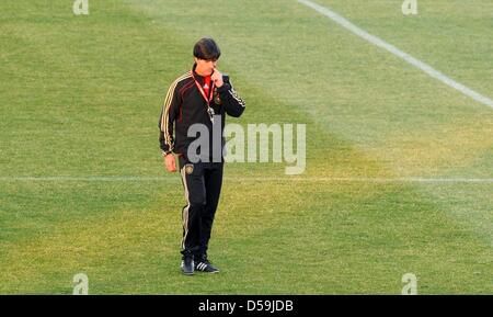 German coach Joachim Loew during a training session of the German national soccer team at the Super Stadium in Atteridgeville near Pretoria, South Africa, 25 June 2010. Photo: Marcus Brandt dpa Stock Photo