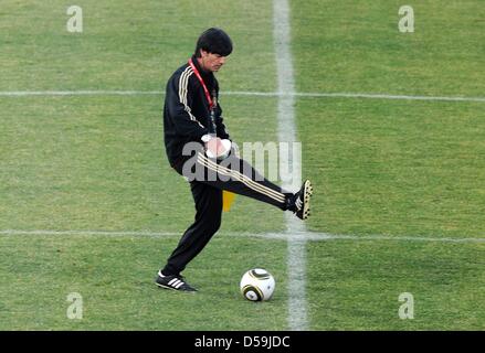 German coach Joachim Loew during a training session of the German national soccer team at the Super Stadium in Atteridgeville near Pretoria, South Africa, 25 June 2010. Photo: Marcus Brandt dpa Stock Photo