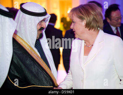 The Chancellor of Germany Angela Merkel talks to King Abdullah of Saudi-Arabia during a reception for the participants of the G-20 summit in Toronto, Canada on 26 June 2010. PHOTO: GERMAN GOVERNMENT/BERGMANN Stock Photo