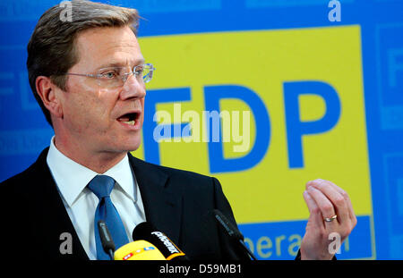 Chairman of the Free Liberals (FDP) Guido Westerwelle delivers a speech after his party's conclave in Berlin, Germany, 28 June 2010. Photo: WOLFGANG KUMM Stock Photo