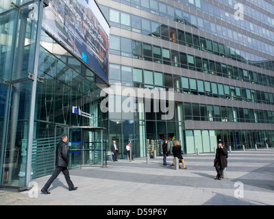 People in front of the European Commission office building in Brussels, Belgium Stock Photo