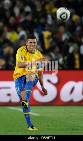 Brazil's Lucio during the 2010 FIFA World Cup Round of Sixteen match between Brazil and Chile at the Ellis Park Stadium in Johannesburg, South Africa 28 June 2010. Photo: Marcus Brandt dpa - Please refer to http://dpaq.de/FIFA-WM2010-TC Stock Photo