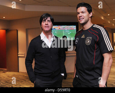 World Cup 2010 - The injured captain of the German national soccer team Michael Ballack (R) meets the German federal trainer Joachim Loew (L) in the hotel Southern Sun in Cape Town, South Africa, 01 July 2010. Photo: Press Photo: ULMER/ Michael Kienzler dpa Stock Photo