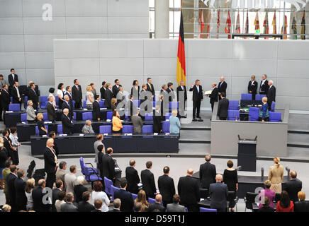The new German President Christian Wulff  swears his oath to office on the German constitution in front of the assembled members of the Bundestag and the Federal Council in Berlin, Germany on 2 July 2010. The President of the Bundestag Norbert Lammert (R) administers the oath. The former Prime Minister of Lower Saxony Wulff was elected tenth German President in the third ballot wit Stock Photo