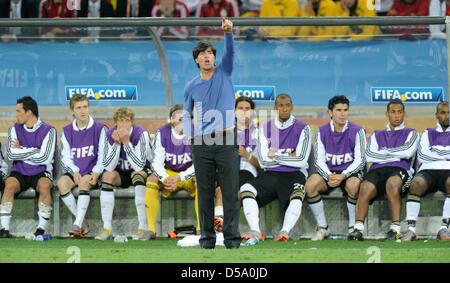 German coach Joachim Loew gestures during the 2010 FIFA World Cup semi-final match between Germany and Spain at the Durban Stadium in Durban, South Africa 07 July 2010. Spain won 1-0. Photo: Marcus Brandt dpa - Please refer to http://dpaq.de/FIFA-WM2010-TC Stock Photo