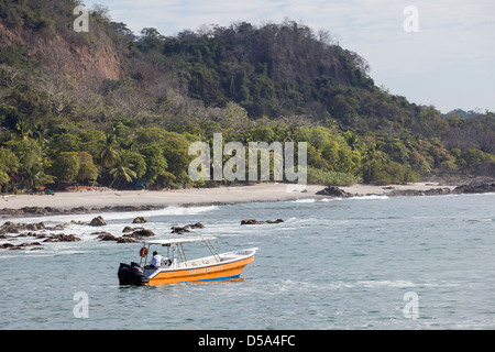 Tour boats at Playa Montezuma, Puntarenas Province of Costa Rica. Stock Photo