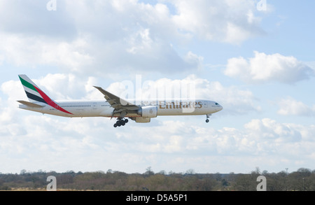 Emirates 777 coming in to land Stock Photo