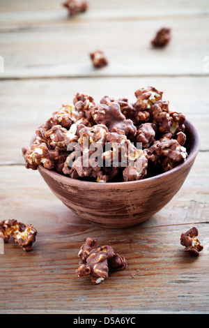 Chocolate pop corn in small brown bowl Stock Photo